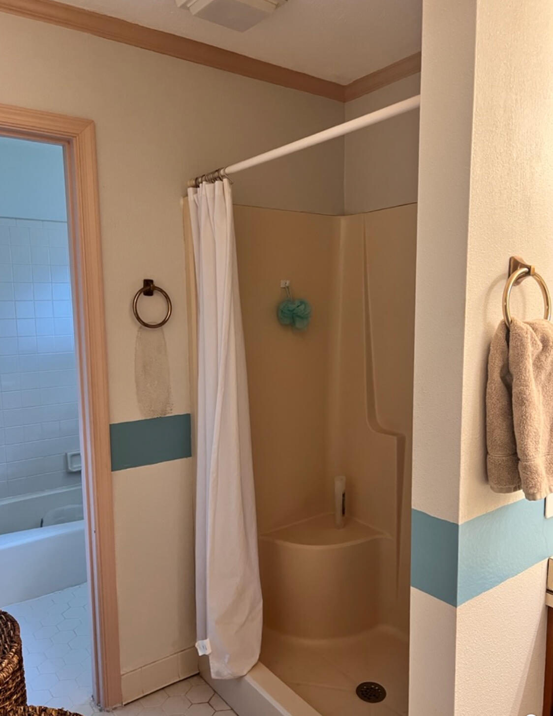 Before construction, the circulation pattern and layout made the room feel disconnected and dated.