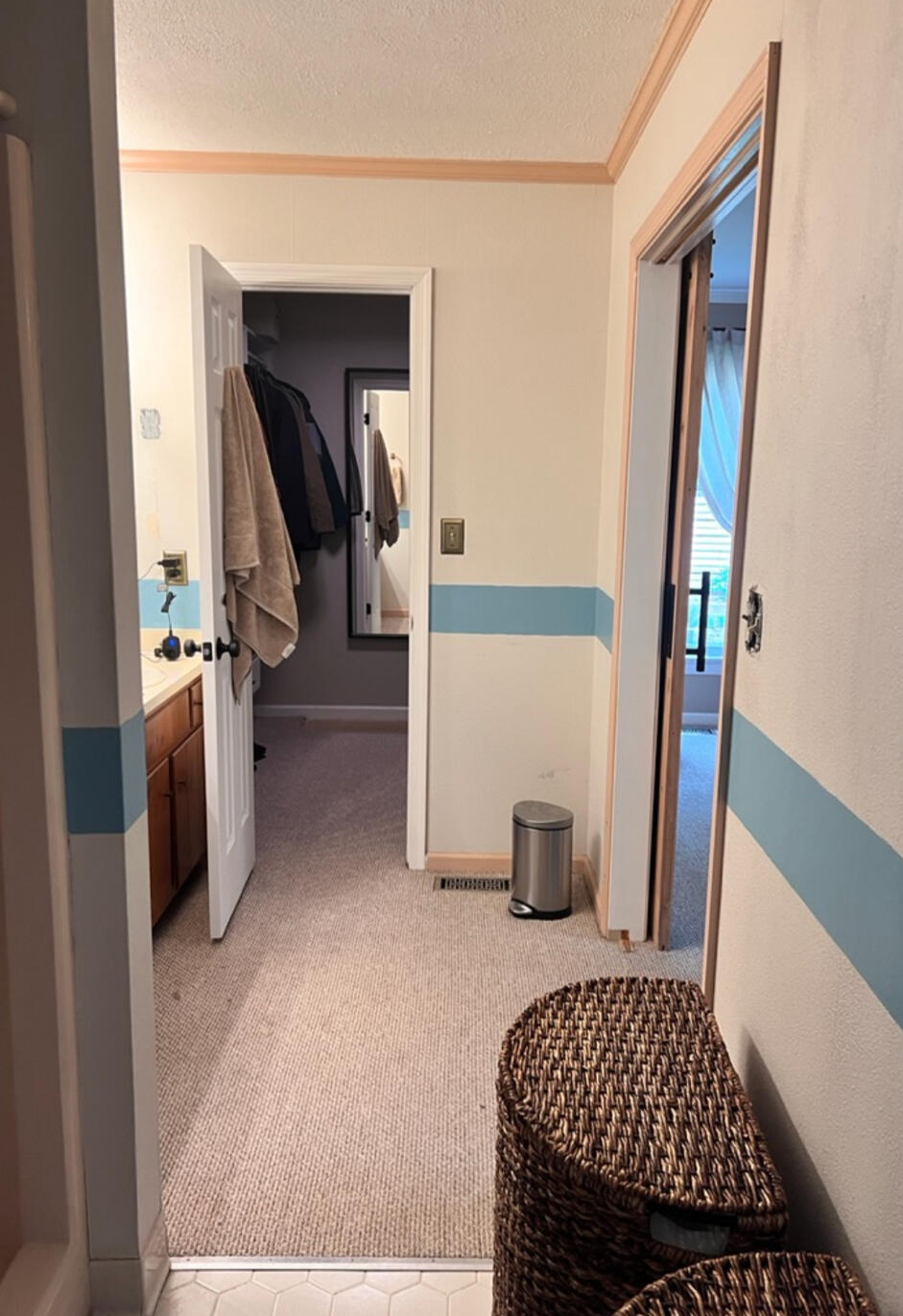 Before construction, the circulation pattern and layout made the room feel disconnected and dated.