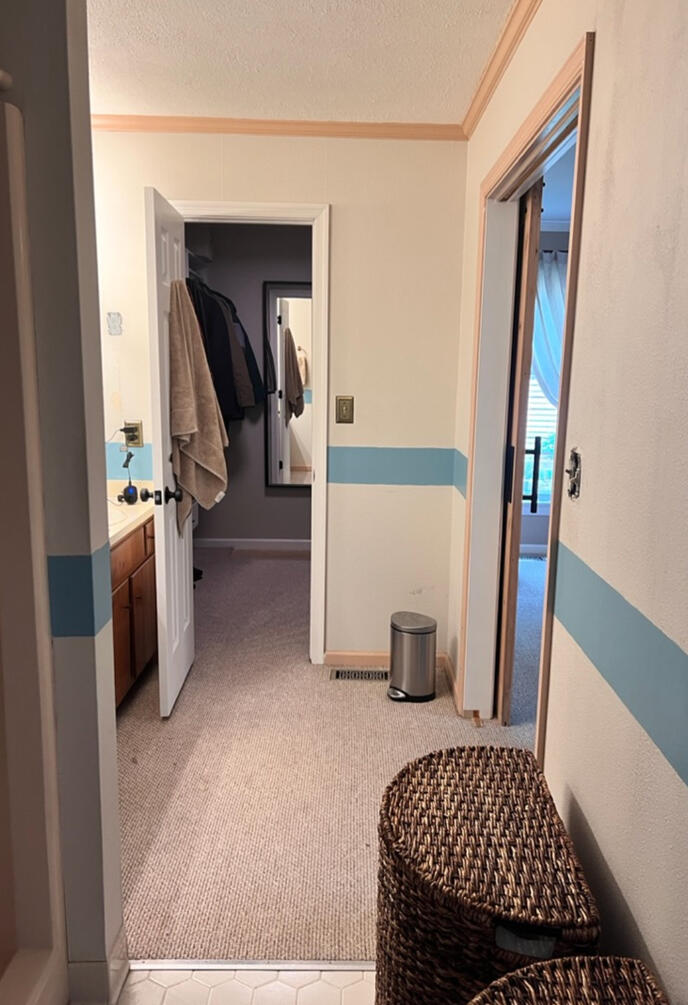 Before construction, the circulation pattern and layout made the room feel disconnected and dated.
